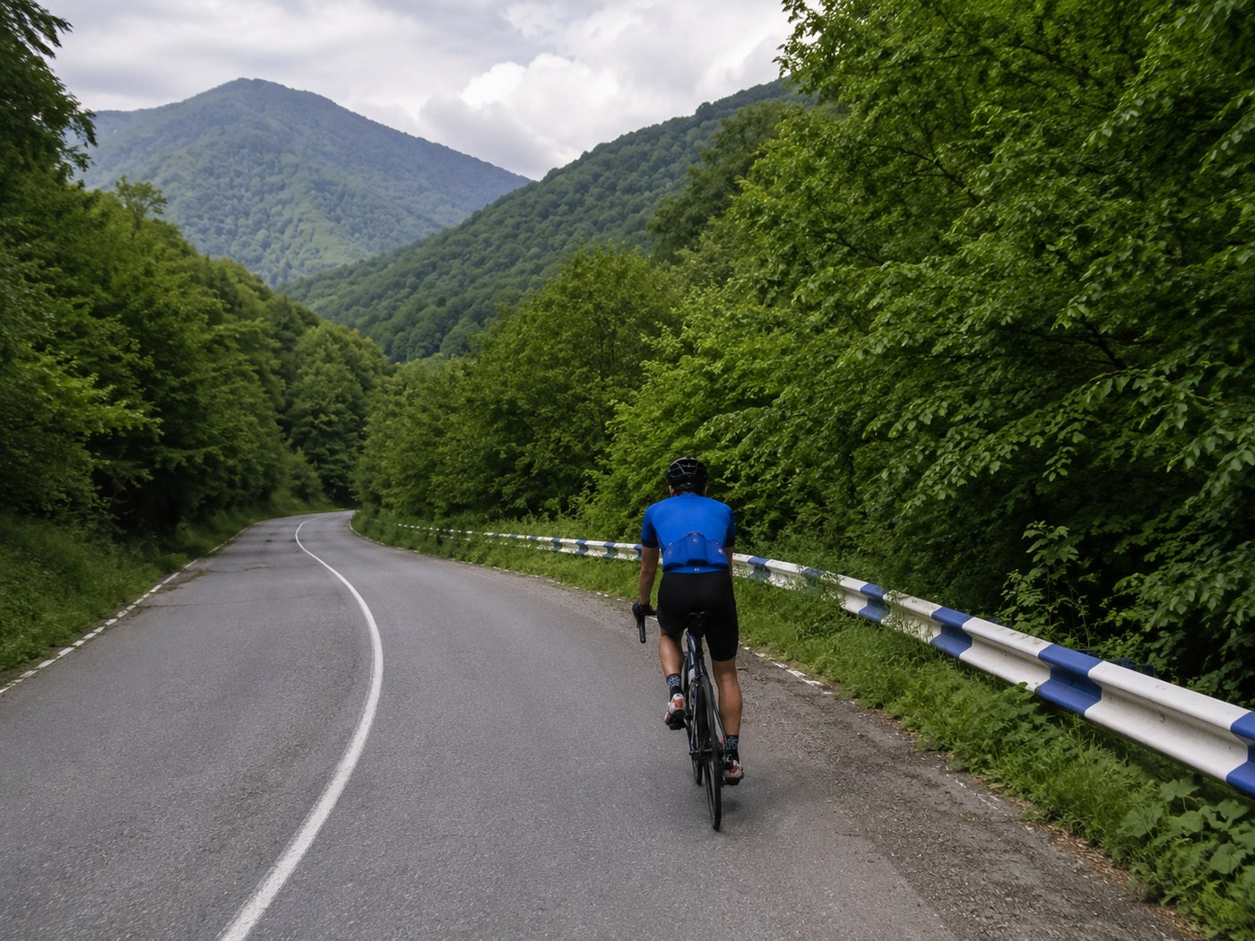 Cyclist on the shore road of Lake Sevan